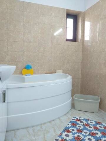 Фото номера Улучшенный двухместный номер с 1 кроватью Гостевой дом Casa din Deal г. Корбу 38
