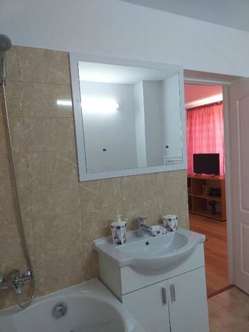 Фото номера Улучшенный двухместный номер с 1 кроватью Гостевой дом Casa din Deal г. Корбу 48