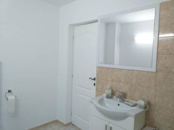 Фото номера Улучшенный двухместный номер с 1 кроватью Гостевой дом Casa din Deal г. Корбу 45