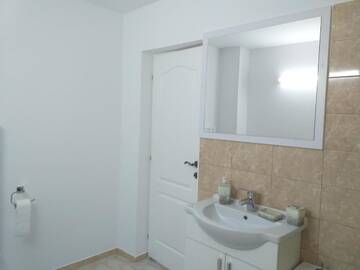 Фото номера Улучшенный двухместный номер с 1 кроватью Гостевой дом Casa din Deal г. Корбу 22