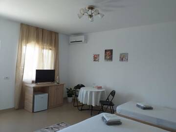 Фото номера Улучшенный двухместный номер с 1 кроватью Гостевой дом Casa din Deal г. Корбу 57