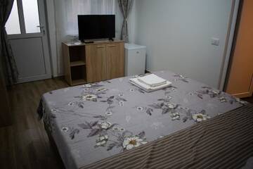 Фото номера Двухместный номер с 1 кроватью и собственной ванной комнатой Гостевой дом Casa Adrian г. Корбу 7